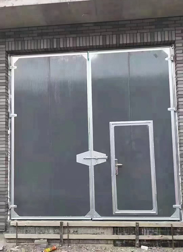 石河子工业平开门在大型设备制造车间的应用实例